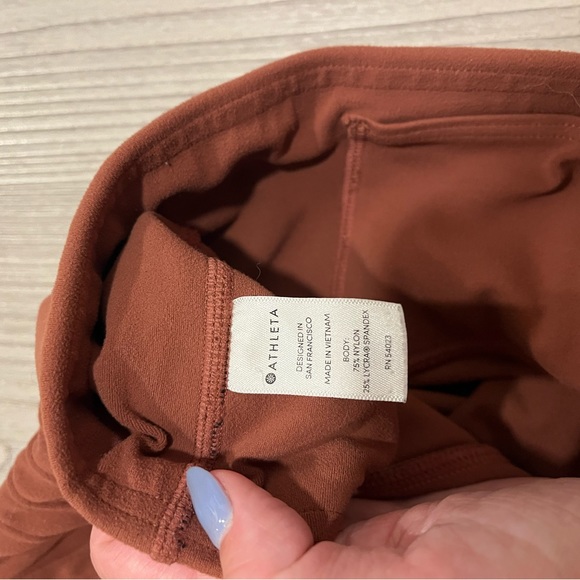 Athleta Moto style leggings in a orange brown color - Picture 6 of 7